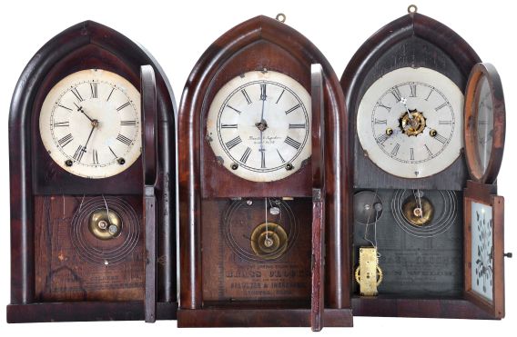 Clocks- 3 (Three): (1) E. N. Welch, Forestville, Conn., Beehive style shelf clock with a spring driven 30 hour time and strike movement in a rosewood veneered case., c1860; (2) Brewster & Ingrahams, Bristol, Conn., Beehive style shelf clock with a spring driven, 8 day, time and strike movement in a mahogany veneered case., c1850; (3) William L. Gilbert & Co., Winchester, Conn., Beehive style shelf clock with a spring driven, 8 day, time and strike movement in a mahogany veneered case, c1855,