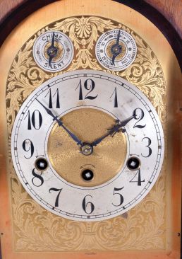 Junghans, Germany, 8 day spring driven movement, three train Westminster chime bracket clock with A13 movement in an architectural style mahogany case. The clock chimes the quarters on 4 rods. The hour is struck on a fifth deeper toned rod, c1900.