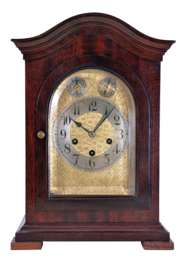 Junghans, Germany, 8 day spring driven movement, three train Westminster chime bracket clock with a B10 movement in a mahogany case. The clock chimes the quarters on 4 rods, while the hour is struck on a separate deeper toned rod.