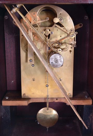 Junghans, Germany, 8 day spring driven movement, three train Westminster chime bracket clock with a B10 movement in a mahogany case. The clock chimes the quarters on 4 rods, while the hour is struck on a separate deeper toned rod.