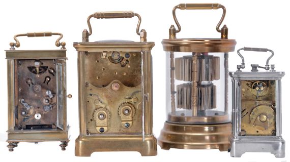 Carriage clocks- 4 (Four): One Waterbury time and strike with hour repeating, brass case with beveled glasses, Roman numeral white enamel dial, a "Plato" clock made in Germany for the Horolovar Clock Co. with brass case, and two German carriage clocks, both timepiece with alarm, one with brass case and beveled glasses, Arabic numeral silvered dial, the other with nickel plated case and Arabic numeral enamel dial, dimensions of Waterbury listed
