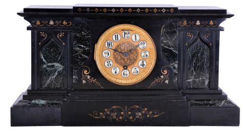 Boston Clock Co., Boston Mass., black mantel clock, 8 day, time and strike with single arbor tandem wind in a black slate case with green marble accents and fancy dial with raised cartouche numerals, c1895.