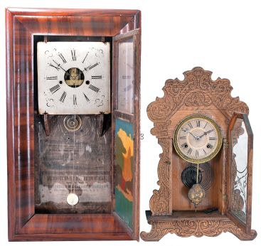 Clocks- 4 (Four) American Wood Case: (1) Seth Thomas Clock Co., Thomaston, Conn., 8 day, time and strike, spring driven movement cabinet clock in oak case with applied metal griffin ornaments, c1892; (2) New Haven Clock Co., New Haven, Conn., "Congressional Line", 8 day, time and strike, spring driven movement cabinet clock in oak case, c1895; (3) Waterbury Clock Co., Waterbury, Conn., "Festus", 8 day, time and strike, spring driven movement gingerbread clock in oak case, c1906; (4) Forestville Manufacturing Company, Bristol, Conn., 8 day, time and strike, weight-driven OOG clock in rosewood veneer case, c1850.