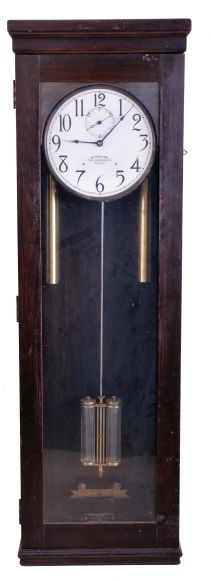 International Time Recording Co., Endicott, New York, "Model No. 16-2" wall hanging master clock, 8 day, time only, weight driven movement with two jar mercury pendulum, in a dark finished wooden case with painted metal dial, serial #425576