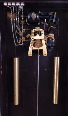 International Time Recording Co., Endicott, New York, "Model No. 16-2" wall hanging master clock, 8 day, time only, weight driven movement with two jar mercury pendulum, in a dark finished wooden case with painted metal dial, serial #425576
