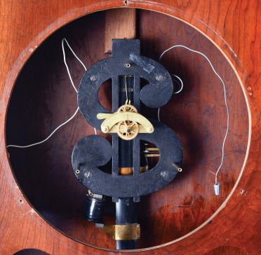 New York Standard Watch Co., Jersey City, New Jersey, electric hanging regulator, walnut case with molded door and base, Roman numeral painted dial with brass bezel, in line movement with Hipp toggle, pendulum with ebonized wooden rod and heavy brass clad ball