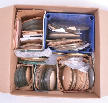 Clock Glasses: Large assortment of hundreds of clock glasses including flat and convex as well as some flat decorated tablets.
