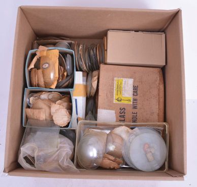 Clock Glasses: Large assortment of hundreds of clock glasses including flat and convex as well as some flat decorated tablets.