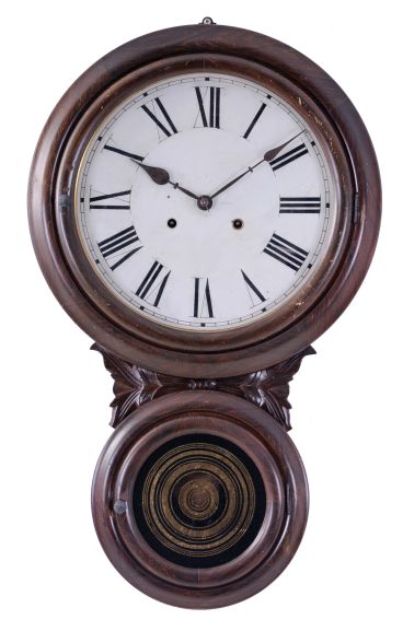 E. N. Welch Mfg. Co., Forestville, Conn., "Alexis No. 1" wall hanging clock with a spring driven 30 day time only movement in a rosewood veneered case with faux grained bezels.