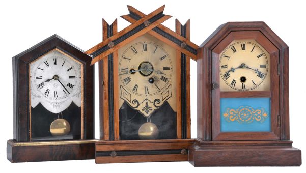 Clocks- 7 (Seven): (1) Ansonia Clock Co., New York, unidentified cottage shelf clock with a spring driven 30 hour timepiece movement in a wood case, c1890; (2) E. Ingraham & Co., Bristol, Conn., "OK" shelf clock with a spring driven 30 hour time and alarm movement in a light wood case, c1884; (3) Jerome and Co., New Haven, Conn., unidentified cottage shelf clock with a spring driven 30 hour movement in a rosewood veneered case, c1870; (4) Jerome & Co., New Haven, Conn., "Rose Cottage" shelf clock with a spring driven 30 hour time and alarm movement in a rosewood veneered case, c1870; (5) Seth Thomas Clock Co., Thomaston, Conn., cottage shelf clock with a spring driven 30 hour movement in a rosewood and mahogany veneered case, c1875; (6) Badenia Clock Manufactory, Bavaria, Germany cottage shelf clock with a spring driven 30 hour time and alarm movement in a grained wooden case, c1870; (7) Seth Thomas Clock Co., Plymouth Hollow, Conn. cottage shelf clock with a spring driven time and alarm movement in a rosewood veneered case, c1860.