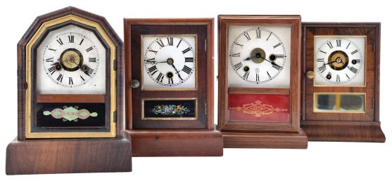 Clocks- 7 (Seven): (1) Ansonia Clock Co., New York, unidentified cottage shelf clock with a spring driven 30 hour timepiece movement in a wood case, c1890; (2) E. Ingraham & Co., Bristol, Conn., "OK" shelf clock with a spring driven 30 hour time and alarm movement in a light wood case, c1884; (3) Jerome and Co., New Haven, Conn., unidentified cottage shelf clock with a spring driven 30 hour movement in a rosewood veneered case, c1870; (4) Jerome & Co., New Haven, Conn., "Rose Cottage" shelf clock with a spring driven 30 hour time and alarm movement in a rosewood veneered case, c1870; (5) Seth Thomas Clock Co., Thomaston, Conn., cottage shelf clock with a spring driven 30 hour movement in a rosewood and mahogany veneered case, c1875; (6) Badenia Clock Manufactory, Bavaria, Germany cottage shelf clock with a spring driven 30 hour time and alarm movement in a grained wooden case, c1870; (7) Seth Thomas Clock Co., Plymouth Hollow, Conn. cottage shelf clock with a spring driven time and alarm movement in a rosewood veneered case, c1860.