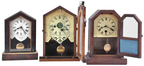 Clocks- 7 (Seven): (1) Ansonia Clock Co., New York, unidentified cottage shelf clock with a spring driven 30 hour timepiece movement in a wood case, c1890; (2) E. Ingraham & Co., Bristol, Conn., "OK" shelf clock with a spring driven 30 hour time and alarm movement in a light wood case, c1884; (3) Jerome and Co., New Haven, Conn., unidentified cottage shelf clock with a spring driven 30 hour movement in a rosewood veneered case, c1870; (4) Jerome & Co., New Haven, Conn., "Rose Cottage" shelf clock with a spring driven 30 hour time and alarm movement in a rosewood veneered case, c1870; (5) Seth Thomas Clock Co., Thomaston, Conn., cottage shelf clock with a spring driven 30 hour movement in a rosewood and mahogany veneered case, c1875; (6) Badenia Clock Manufactory, Bavaria, Germany cottage shelf clock with a spring driven 30 hour time and alarm movement in a grained wooden case, c1870; (7) Seth Thomas Clock Co., Plymouth Hollow, Conn. cottage shelf clock with a spring driven time and alarm movement in a rosewood veneered case, c1860.