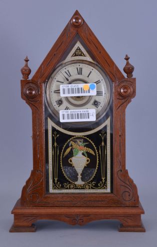 Clocks- 2 (Two): (1) American kitchen clock, time, strike and alarm weight driven movement with reverse painted tablet; (2) Bradley Manf