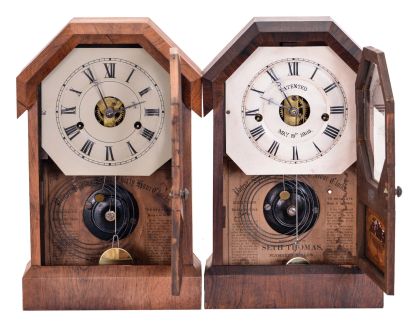 Clocks- 2 (Two): (1) Seth Thomas Clock Co., Thomaston, Conn., "Octagon Top" shelf clock with a spring driven 30 hour time and strike movement (round style) in a rosewood veneered case, c1870; (2) Seth Thomas Clock Co., Plymouth Hollow, Conn., "Octagon Top " shelf clock with a spring driven 30 hour time and strike movement (lyre style) in a rosewood veneered case, c1865.