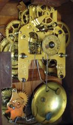 Seth Thomas Clock Co., Thomaston, Conn. with a spring driven 30 hour time, strike and alarm movement shelf clock in a mahogany veneered case.