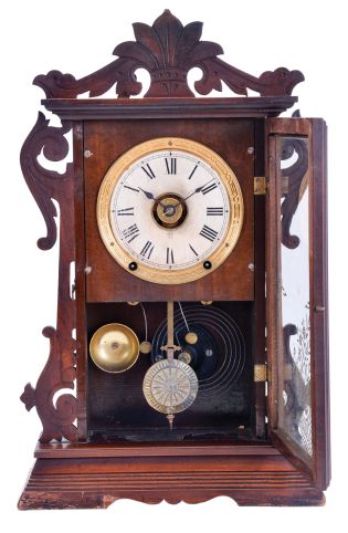 Seth Thomas Clock Co., Thomaston, Conn., "Newark" shelf clock with a spring driven, 8 day time, strike and alarm movement with a patent (British) Winward