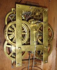 New Haven Clock Co., New Haven, Conn., 8 day, time and strike spring driven movement iron front shelf clock.