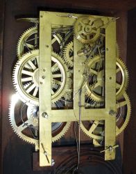 Chauncey Goodrich, Bristol, Conn., 8 day, time and strike spring driven movement iron front shelf clock.