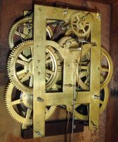 American Clock Co., New York, New York, 8 day, time and strike spring driven movement iron front shelf clock. Movement appears to be a New Haven Clock Co.