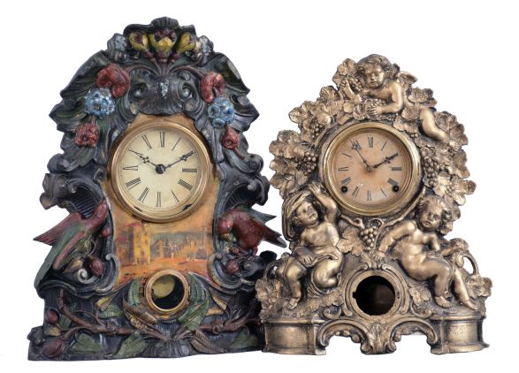 Clocks- 2 (Two): (1) American Clock Co., New York, New York, 8 day, time and strike spring driven movement iron front mantel clock, c1865; (2) American Clock Co., New York, New York, 8 day, time and strike spring driven movement iron front mantel clock. Cast iron front made by N. Muller, New York, No. 42, c1865