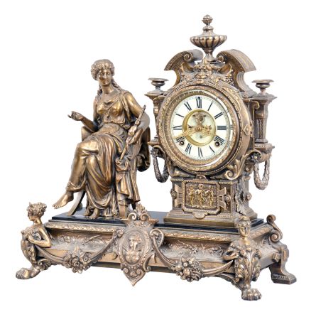 Ansonia Clock Co., New York, NY, "Prosperity" figural mantel clock with a spring driven, 8 day, time and strike movement with visible escapement in a cast metal and enameled iron case.