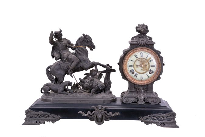 Ansonia Clock Co., New York, NY, "Boar Hunter" figural mantel clock with a spring driven, 8 day, time and strike movement with visible escapement in a enameled iron base with a bronzed spelter statue.