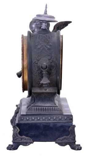 Ansonia Clock Co., New York, NY, "Cupid" figural mantel clock with an 8 day spring driven time and half hour strike movement with visible escapement in a cast metal case.