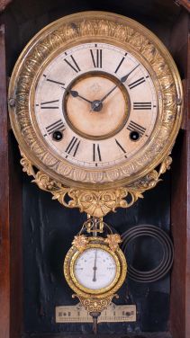 Ansonia Clock Co., New York, NY, "Monarch" mantel clock with 8 day, spring driven time and strike movement, in a walnut case with applied metal ornaments, patented pendulum, and dedication plaque dated 1892.