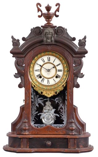 Ansonia Clock Co., New York, NY, "Monarch" shelf clock with a spring driven, 8 day time and half hour strike movement in a black walnut case.