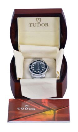 Tudor, Switzerland, "Submariner", ref. 79190, 25 jewels, Eta cal.2824-2, automatic winding, spotted nickel plate movement with lever escapement in a stainless steel, water resistant case, and luminous dot and arrow marker black dial with date aperture at 3:00, polished, luminous Mercedes style hands, and stainless bracelet with deployant clasp, serial #B872254, 39mm, c1995, together with its original inner and outer boxes.