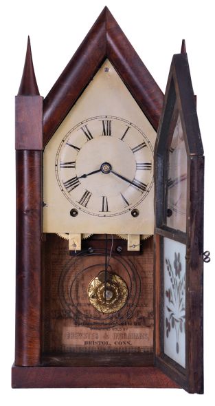 Brewster and Ingrahams, Bristol, Conn., 8 day, time and strike spring driven movement sharp gothic or steeple clock with brass springs.