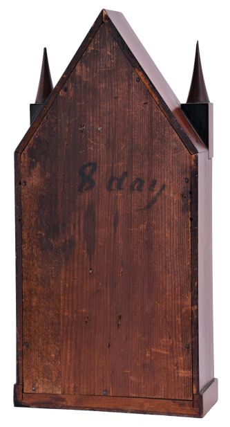 Brewster and Ingrahams, Bristol, Conn., 8 day, time and strike spring driven movement sharp gothic or steeple clock with brass springs.