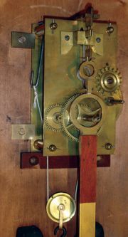 E. Howard & Co., Boston, Mass., "No. 6 Regulator", wall clock, 8 day, time only, weight driven movement in a walnut case with a painted metal dial and reverse painted throat and lower tablets