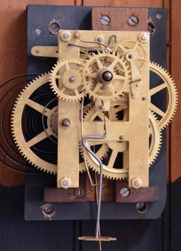 Sidney Advertising Clock Co., Sidney Otsego County, New York, huge "Advertising", wall clock, 8 day, time and calendar, spring driven movement in a soft wood case with a papered metal dial and a separate movement for rotating advertising canisters every five minutes.