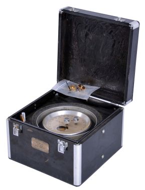 Thomas Mercer Ltd., St. Albans, England, for M. Low, Inc., New York, break circuit chronometer with mechanism for sending a signal at regular intervals, 13 jewel, two day fusee movement with Z balance, and spring detent escapement, an auxiliary wheel mounted to the the fourth wheel arbor closing a pair of contacts five times per minute at ten second intervals, and contained in an aluminum canister silvered 24 hour dial, blued steel hands, all contained in a black Bakelite box with aluminum corners, serial # 23506, mid 20th century