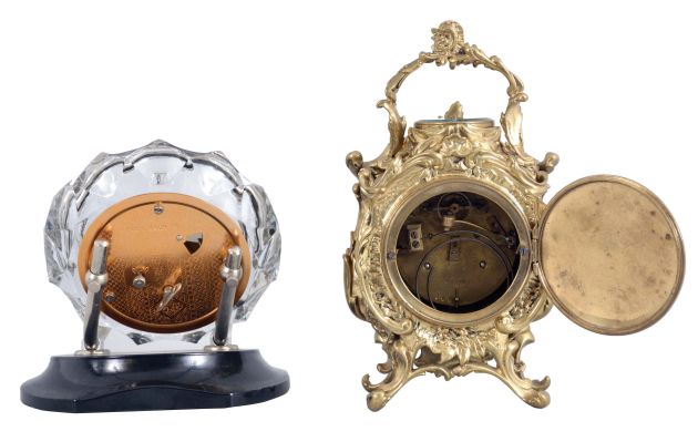 Clocks- 2 (Two) Desk Clocks: (1) France, desk compendium with aneroid barometer and two thermometers, 8 day, time and strike balance wheel movement in a Rococo revival brass case holding a polychrome enamel dial; (2) Majak, USSR, desk clock with balance wheel movement in a Mid-century Modern cut and polished crystal case held by two curved supports mounted to a black plastic base.