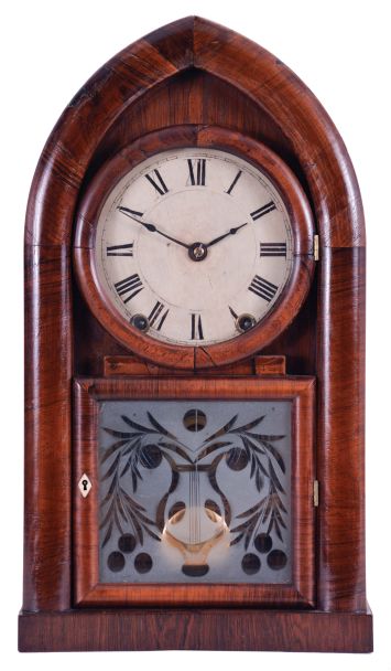 J. J. Beals, Boston, Mass. (Brewster & Ingrahams, Bristol, Conn.) 8 day, time and strike spring driven movement Round Gothic or beehive shelf clock. This is a rack striking movement with the springs contained in cast iron cups.