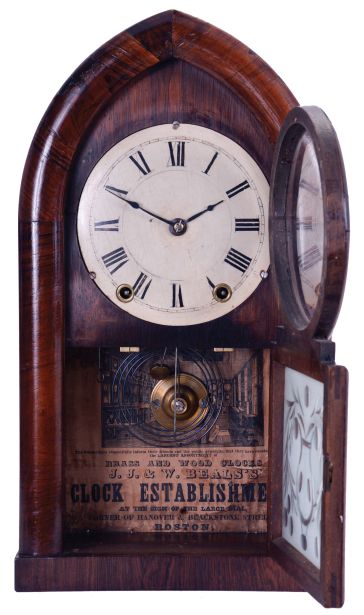 J. J. Beals, Boston, Mass. (Brewster & Ingrahams, Bristol, Conn.) 8 day, time and strike spring driven movement Round Gothic or beehive shelf clock. This is a rack striking movement with the springs contained in cast iron cups.