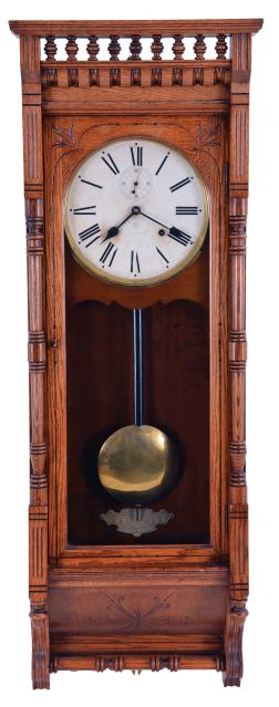 Ansonia Clock Co., New York, NY, "Santa Fe" hanging clock with a spring driven, 8 day time and half hour strike (cathedral gong) in an oak case.