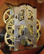 Ansonia Clock Co., New York, NY, "Santa Fe" hanging clock with a spring driven, 8 day time and half hour strike (cathedral gong) in an oak case.