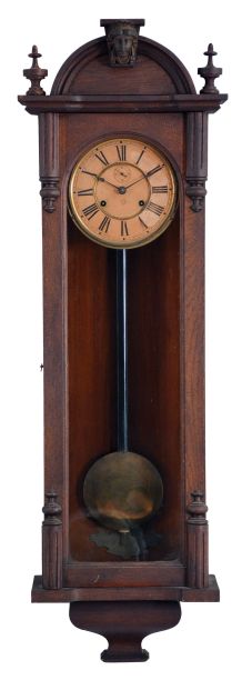 Ansonia Clock Co., New York, NY, "Capitol" wall hanging clock with a spring driven, 8 day timepiece movement in an oak case.