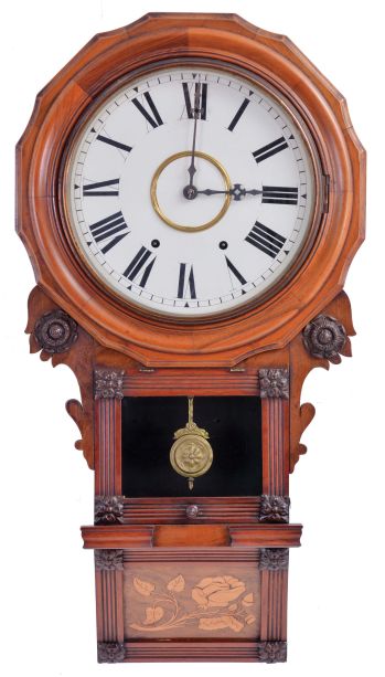 Anglo American 8 day, time and strike spring driven movement wall clock with a movement made by the New Haven Clock Co.