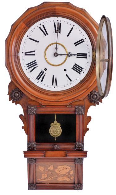 Anglo American 8 day, time and strike spring driven movement wall clock with a movement made by the New Haven Clock Co.