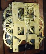 Anglo American 8 day, time and strike spring driven movement wall clock with a movement made by the New Haven Clock Co.