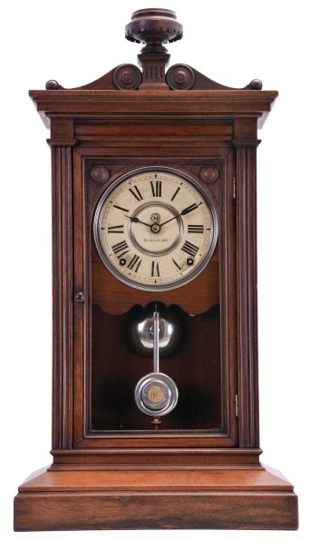 Seth Thomas Clock Co., Thomaston, Conn., "Greek" shelf clock with a spring driven, 8 day, time and strike, lyre movement in a walnut case.