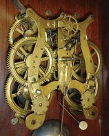 Seth Thomas Clock Co., Thomaston, Conn., "Greek" shelf clock with a spring driven, 8 day, time and strike, lyre movement in a walnut case.