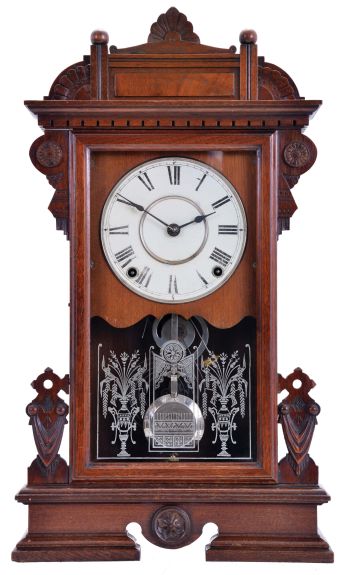 Seth Thomas Clock Co., Thomaston, Conn., "Ogden" shelf clock with a spring driven, 8 day, time and strike, lyre movement in a walnut case.
