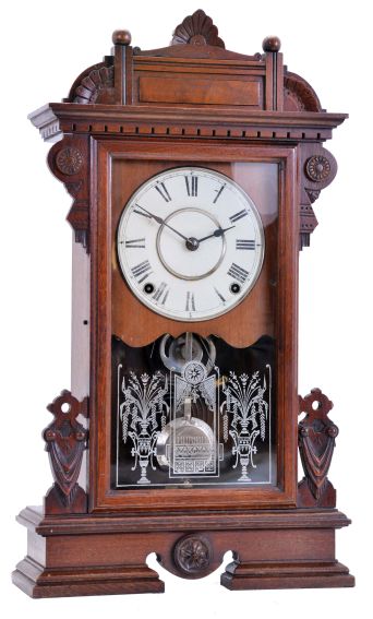Seth Thomas Clock Co., Thomaston, Conn., "Ogden" shelf clock with a spring driven, 8 day, time and strike, lyre movement in a walnut case.