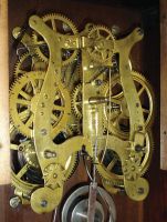 Seth Thomas Clock Co., Thomaston, Conn., "Ogden" shelf clock with a spring driven, 8 day, time and strike, lyre movement in a walnut case.
