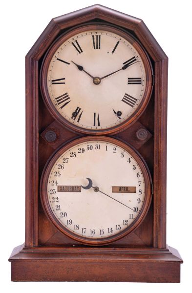 Seth Thomas Clock Co., Thomaston, Conn., "Parlor Calendar No. 5" shelf clock with a spring driven, 8 day, time and strike movement with the R. T. Andrews patented perpetual calendar mechanism in a polished walnut veneered case.